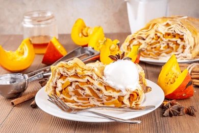 Pumpkin Crepes with Fontina Cheese Sauce