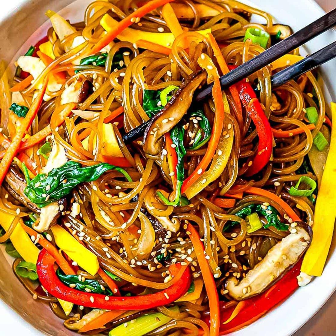 Chap Chee Noodles: A Delicious Korean-Style Glass Noodle Stir-Fry with Colorful Vegetables, Mushrooms, and Savory Sesame Soy Sauce
