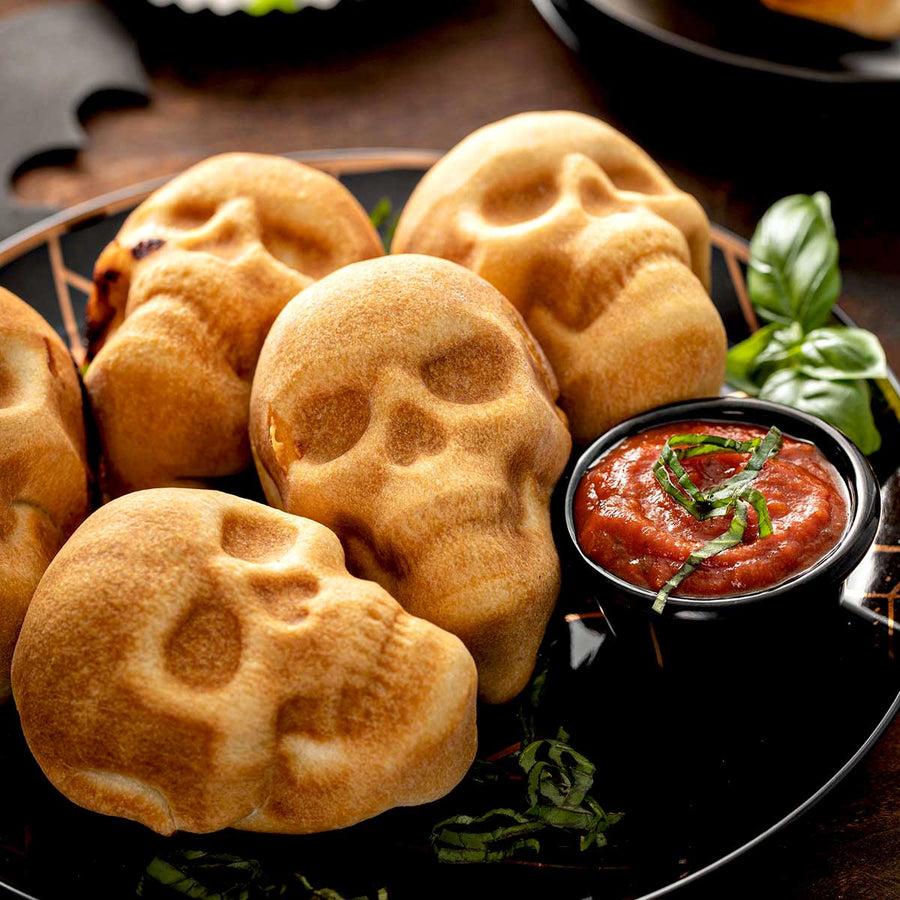 Pizza Skulls: Easy Cheesy Halloween Pizza Bites Filled with Savory Sauce, Melted Mozzarella, and Delicious Pizza Toppings