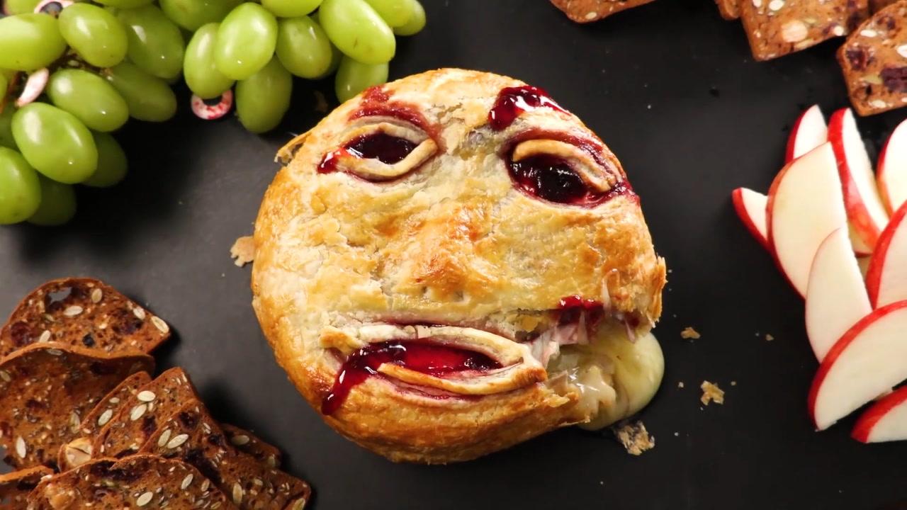 Scary Baked Brie: A Spooktacular Halloween Cheese Appetizer with Gooey Brie, Golden Puff Pastry, and Creepy Edible Decorations